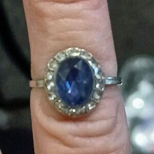 Sterling-Style Blue Oval Halo Ring with Clear Accent Stones